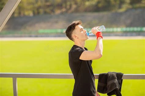 Fitness Man Drinking Water From Bottle Thirsty Athlete Having Cold