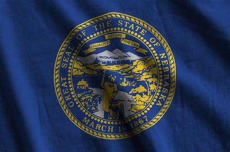Premium Photo Nebraska Us State Flag With Big Folds Waving Close Up