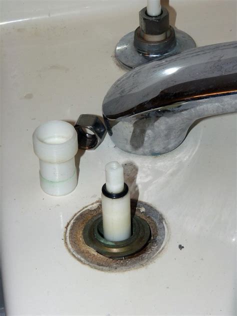 How to fix a leaky compression faucet: Leaking Moen Roman tub faucet - can't ID brand - HELP ...