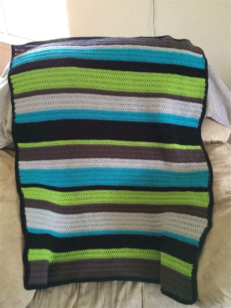 Update to 2019, i still have this blanket and i keep it in my car so i can nap during work lunches. Teal, lime and gray crochet blanket | Loom blanket ...