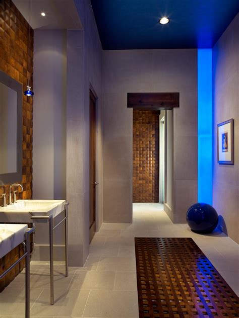 Modern Spa Bathroom With Teak Wall Tiles And Blue Accents