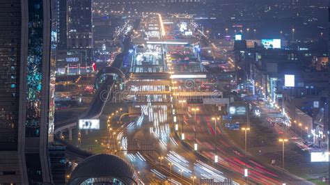 Busy Sheikh Zayed Road Aerial Night Timelapse Metro Railway And Modern
