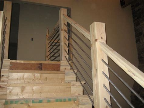 Freestanding decks that are not attached to the house with a ledger board will require an additional beam and row of footings. DIY Cable-Rail Staircase | Diy stair railing, Rustic ...
