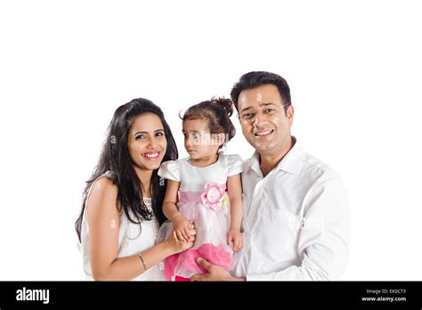 Indian Parents And Daughter Sitting Home Stock Photo Alamy