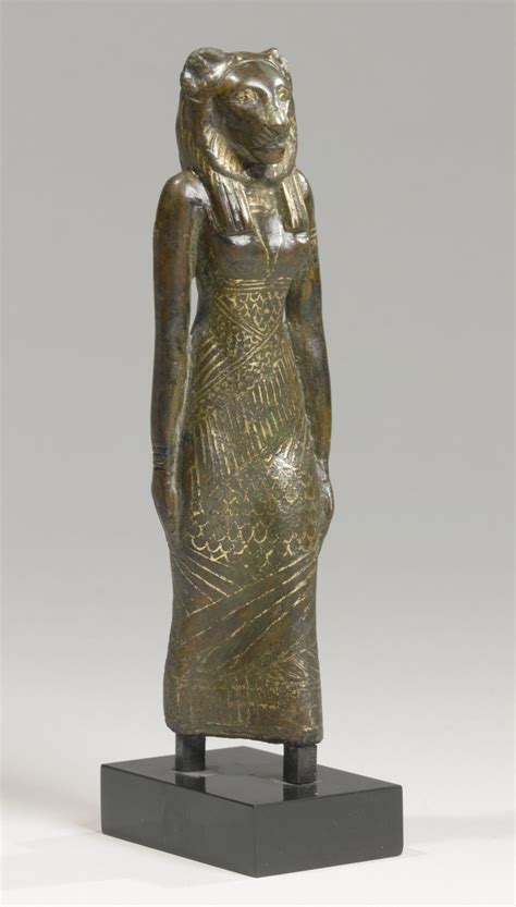 An Egyptian Bronze Figure Of A Lion Headed Goddess 21st22nd Dynasty