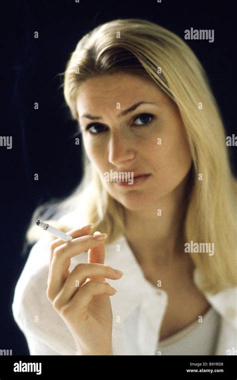 Woman Holding Cigarette Portrait Stock Photo Alamy