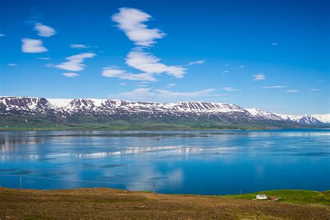 Iceland Eyjafjoerdur Fjord Blue Water Reflection Photograph By Matthias