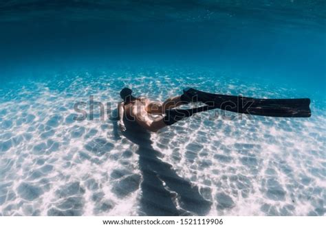 Naked Woman Freediver Glides Over Sandy Stock Photo