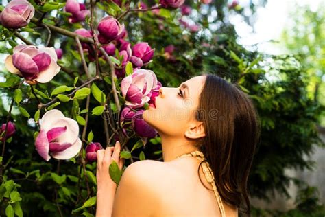 Beauty Spring Girl With Magnolia Flovers Tenderness Sensual Woman Passion And Sensual Touch