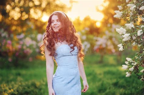 beautiful woman with long hair in the spring in the park stock image image of adult beauty