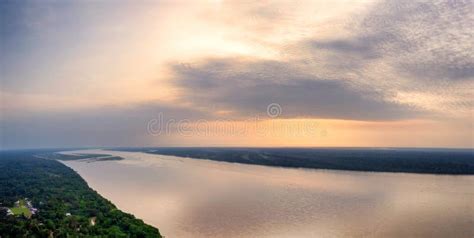 Aerial Panorama View Of The Amazon River And Forest At Sunset Stock
