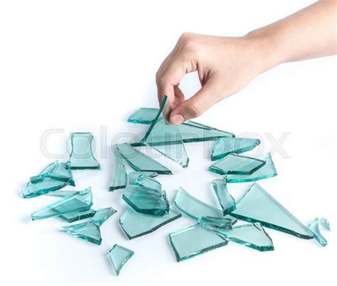 hand holding a broken glass isolated on stock image colourbox
