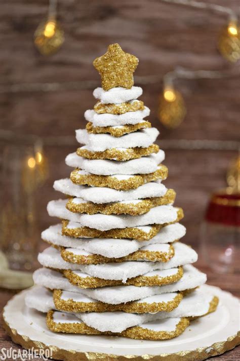 Then add some gingerbread house and cupcake ornaments…or make some cookies in the shape of gingerbread houses if you really want to go with. Gingerbread Christmas Cookie Tree - SugarHero