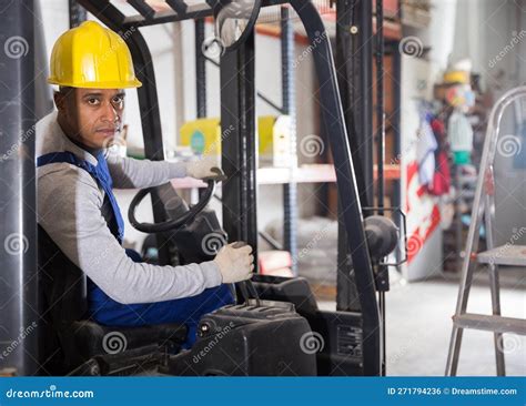 Forklift Driver at the Warehouse of Hardware Store Stock Photo - Image