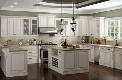 Variable door widths are now available through our these doors use a vinyl coating that is heat wrapped around the face of the door to give you a seamless finish and no exposed corners. RTA Charleston Antique White stylish Kitchen cabinets ~ i ...