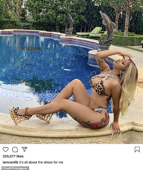 Cardi B Puts Her Iconic Curves On Display In Leopard Bikini As She Poses For Sultry Poolside