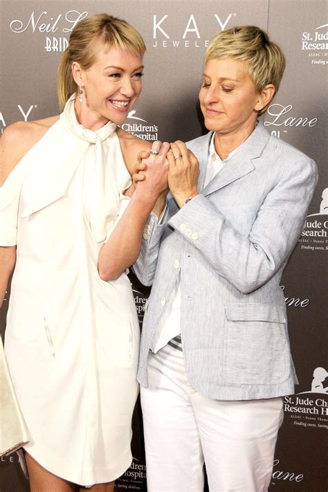 Ellen Degeneres Portia De Rossi Wedding Photos Ellen Degeneres Shares A Kiss With Wife Portia
