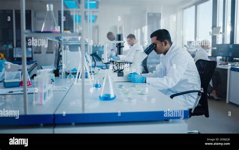 Modern Medical Research Laboratory Diverse Team Of Scientists Working