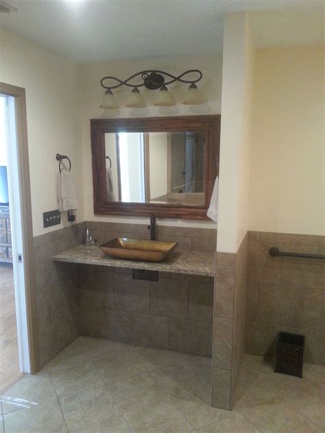 The height of bathroom fixtures and the distance between them are just some of the considerations to be made when designing a wheelchair accessible bathroom. wheelchair accessible sink in master bath..faucet cutoffs ...