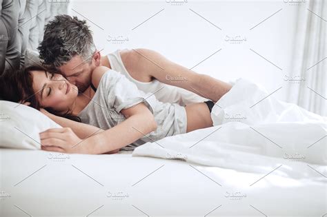 Intimate Young Couple On Bed High Quality People Images ~ Creative Market