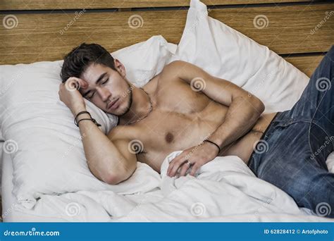 Shirtless Male Model Lying Alone On His Bed Stock Photo Image Of Tempting Indoor