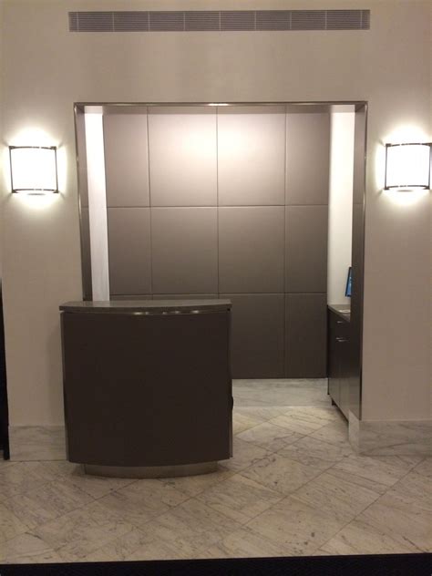 Find new office & desk chairs for your home at. 75th St NYC , custom front desk with leather wall ...