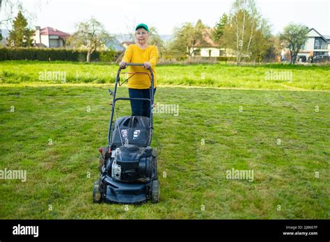 Mowing lawns, Lawn mower on green grass, mower grass equipment, mowing