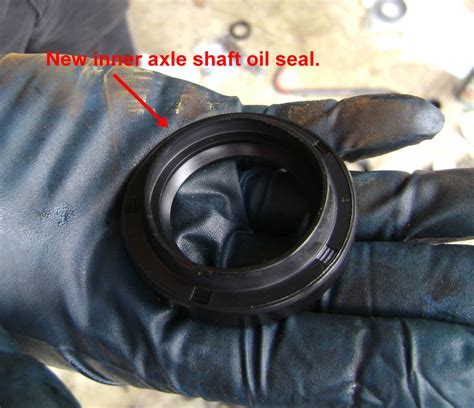 Replacing The Cv Axle Shaft And Output Shaft Seal Or Replacing A Cv