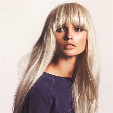 Long Straight Blonde Hairstyle With Blunt Bangs