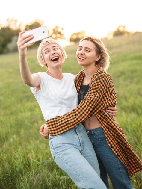 Two Girls Taking Selfie Outdoors Stock Image Image Of Phone Outdoors