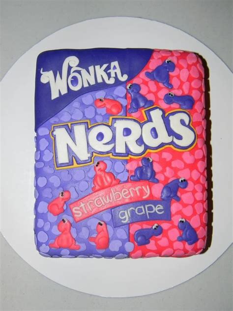 There Is A Cake Made To Look Like A Bag Of Nerds On The Plate