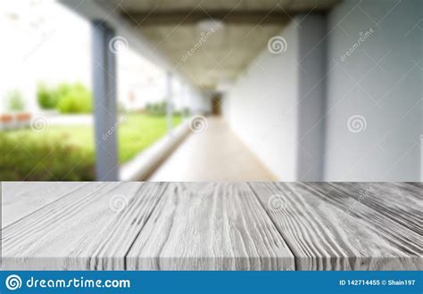 Wood White Table Top On Blur Building Hall Background Form Office
