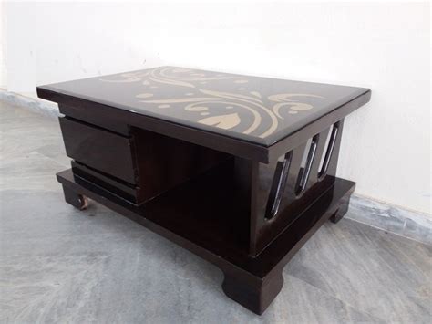 Center tables can be made from wood, marble, glass, or steel depending upon different design. Glass Top Wooden Center Table | Used Furniture for Sale