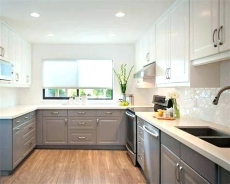 For a contemporary kitchen, paint your cabinets in a frosty white paint color (a white with grayish undertones) and use an abundance of silver and cool grays around the space. houzz kitchen cabinets grey kitchen ideas two color kitchen cabinets glamorous ins… (With images ...