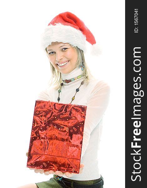 Beauty Blonde Girl In Santa Cap With Christmas T Free Stock Images