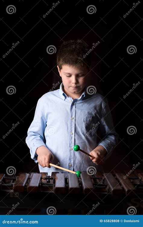 Boy Playing On Xylophone Stock Photo Image Of Dark Bars 65828808
