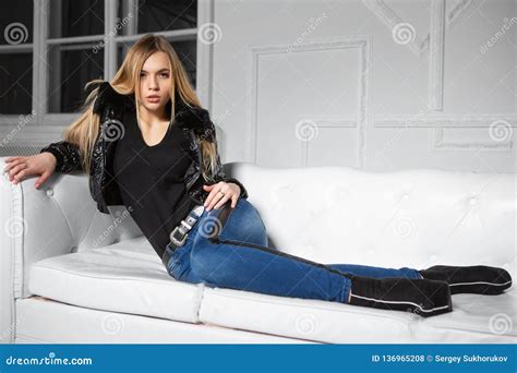 Pretty Woman Posing Lying On A Sofa Stock Photo Image Of Beautiful