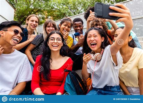 Multiracial Group Of Teen Friends Take Selfie Laughing Together