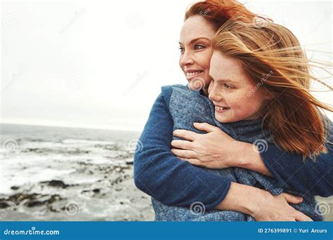 They Share An Unbreakable Bond A Mature Woman Embracing Her Young Daughter At The Waterfront