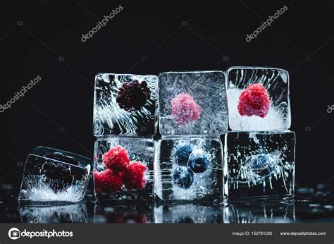Frozen Fruits In Ice Cubes — Stock Photo © Vadimvasenin 162761286