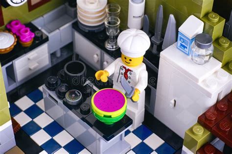 Lego Chef Cutting Watermelon In His Kitchen Editorial Stock Photo
