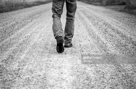 Man Walking On Road Photo Getty Images