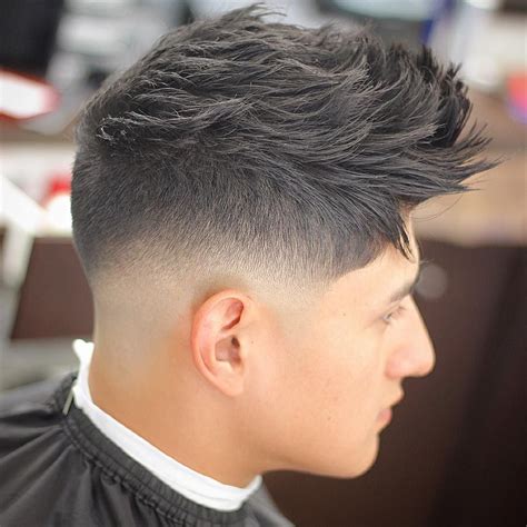 Since low fade usually leaves more hair on the sides and back than high fade, it gives you a great scope to fiddle with varied textures, lengths, and mid fade strikes the perfect balance between the flamboyant high fade and a conservative low fade haircut. Low Fade vs High Fade Haircuts: 5 Cool Styles For 2020 ...