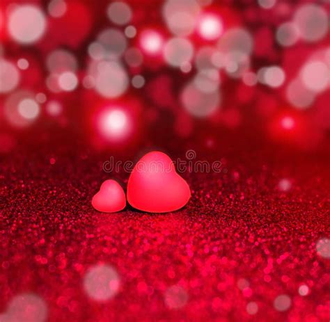 Two Hearts On Red Sparkle Glitter Background Stock Photo Image Of