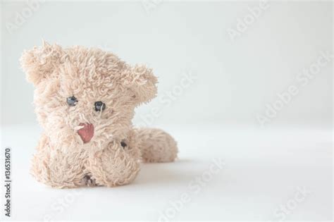Teddy Bear Lying Down Relaxing On Bed Stock Photo Adobe Stock