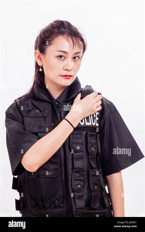Chinese Female Police Officer Calling In On Radio Stock Photo Alamy