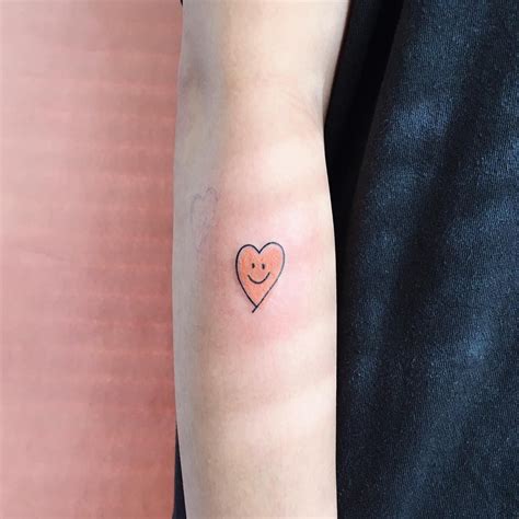 Tiny Smiley Face Heart Tattoo Heart Tattoo Tiny Tattoos Simple Tattoos