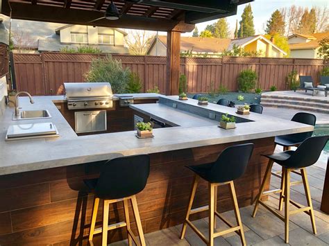 Our finished outdoor kitchens utilize the same bolt together technology as our ready to finish kits. Outdoor bar, bbq, patio, arbor, cement countertop ...