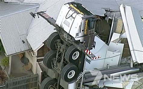 Crane Crashes Into Melbourne Houses Flattens Block And Injures Two 7news