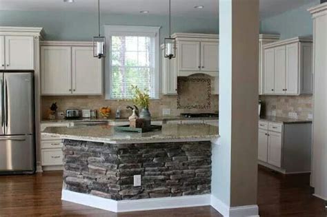 Check out our breakfast bar selection for the very best in unique or custom, handmade pieces from our kitchen & dining tables shops. Love the faux brick | Stone kitchen island, Stone kitchen ...